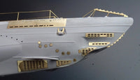 Photo of photo-etched brass parts upgrade set for German U-Boat Type IIB 1:144 scale by Revell and ICM, featuring railings, ladders, and deck details.