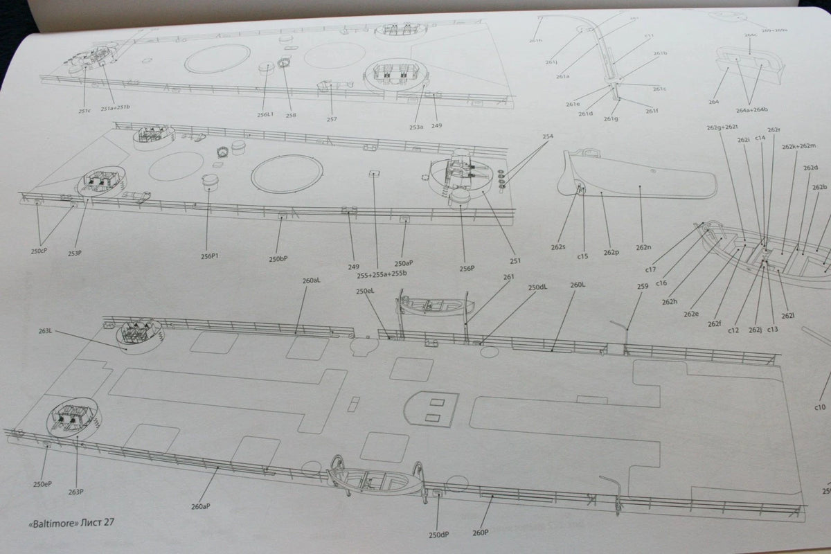 A printed black-and-white technical schematic or assembly diagram sheet with labeled line drawings and callouts on a white page.