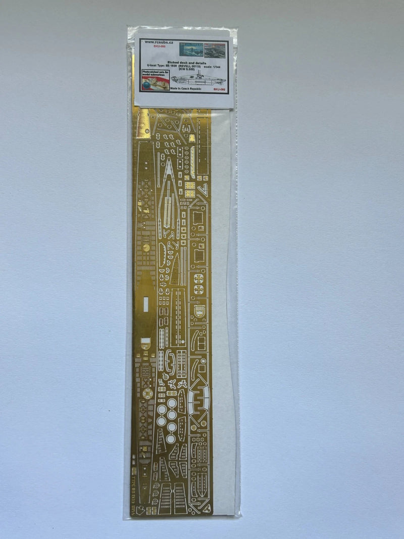 Photo of photo-etched brass parts upgrade set for German U-Boat Type IIB 1:144 scale by Revell and ICM, featuring railings, ladders, and deck details.
