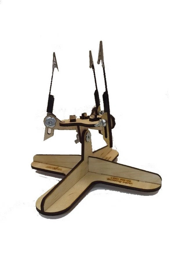 Photo of LMG BB-05 armored vehicle model assembly jig with cross base