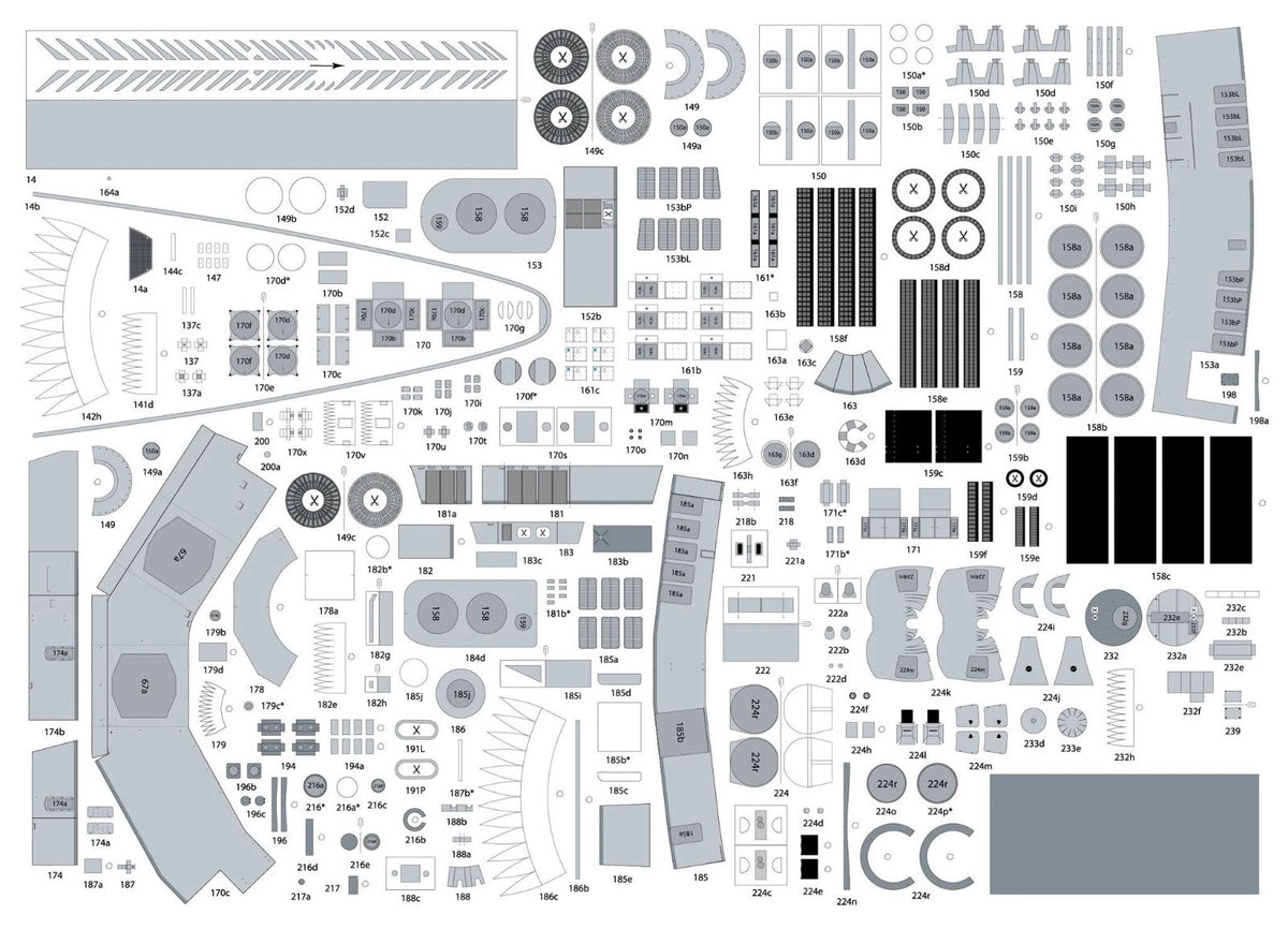 A flat lay sheet of many small gray and black molded pieces arranged in a grid, likely a model kit parts or assembly sheet, photographed on a white background.