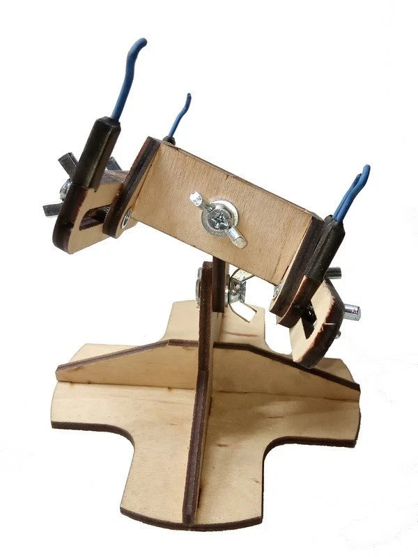 Photo of LMG BB-05 armored vehicle model assembly jig with cross base