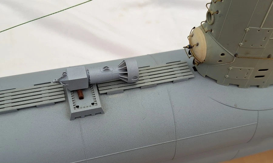 Photo of photo-etched brass detail set for German U-Boat Type XXIII in 1:72 scale, showing deck, railings, and conning tower parts.