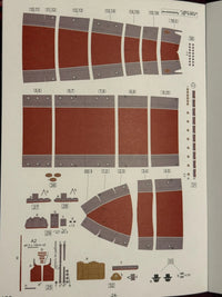 Photo of the Oriel 1:100 scale paper model kit of the Bulgarian torpedo boat Derzky (1912), showing printed sheets and detailed components.