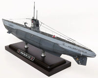 Photo of photo-etched brass parts upgrade set for German U-Boat Type IIB 1:144 scale by Revell and ICM, featuring railings, ladders, and deck details.