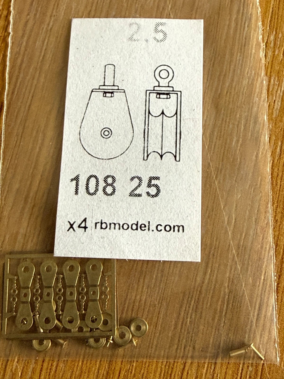 Photo of RB Model 10830 brass double sheave block for ship models, 5.9mm size, pack of 4