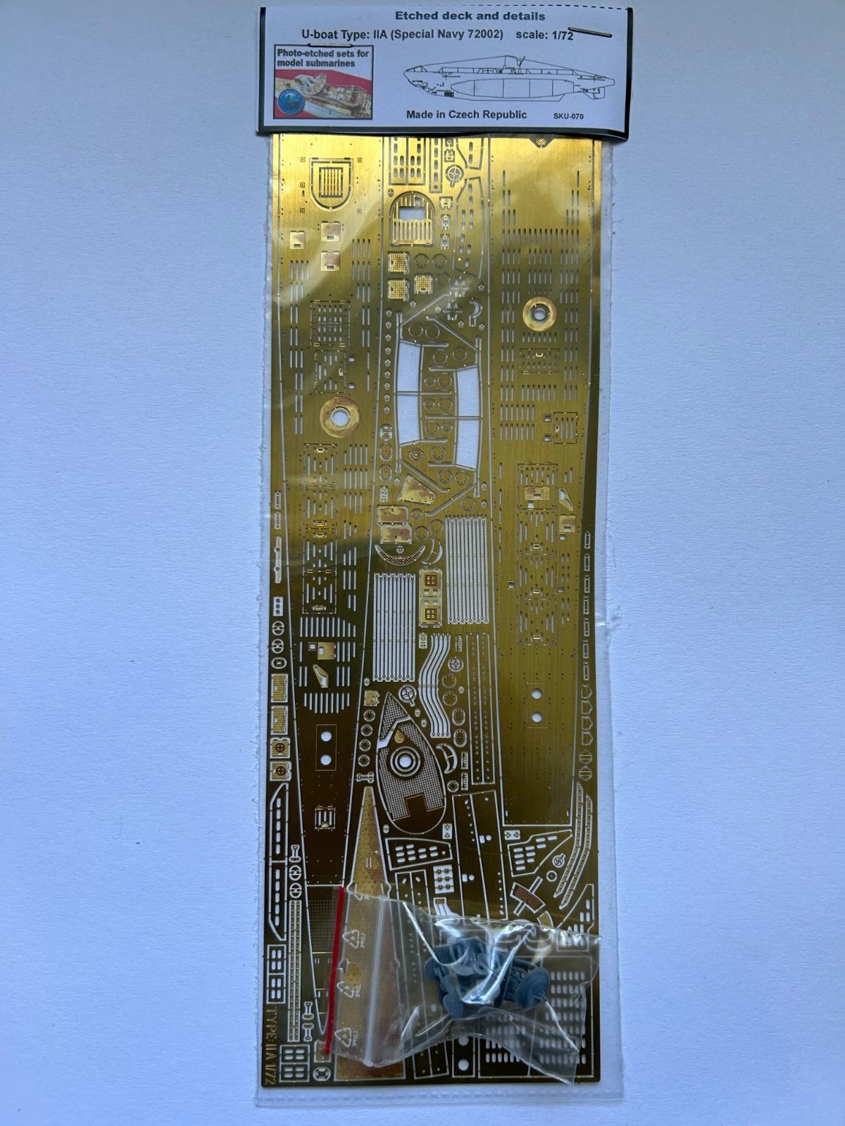 Photo of 1:72 scale photo-etched brass upgrade set for German U-Boat Type IIA, showing deck and conning tower detailing parts.