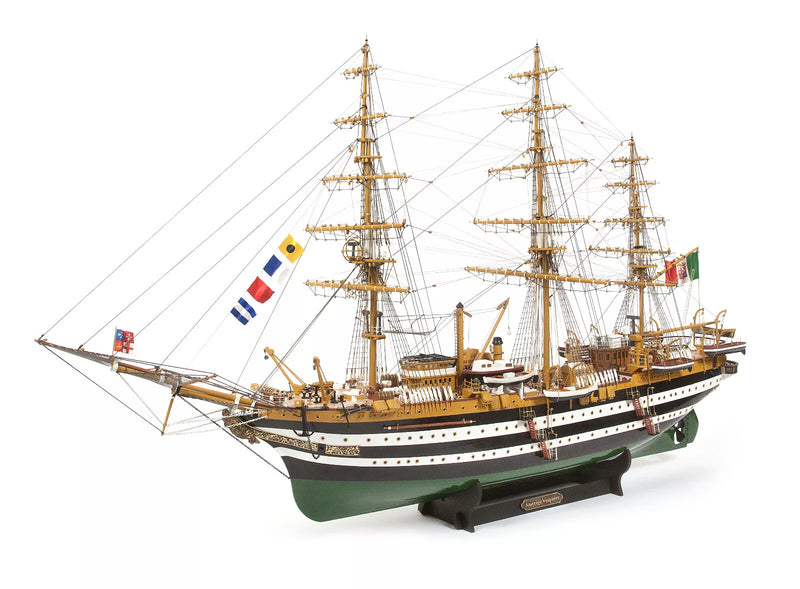 Photo of OcCre Amerigo Vespucci 1:100 wooden model ship kit without sails, showing detailed hull and brass photo-etch parts.