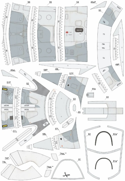 A flat lay of multiple labeled paper template or panel pieces arranged on a white background, likely a model-making or craft kit sheet. The pieces are mostly white with light gray shaded areas, black outlines, and small printed labels or markings.
